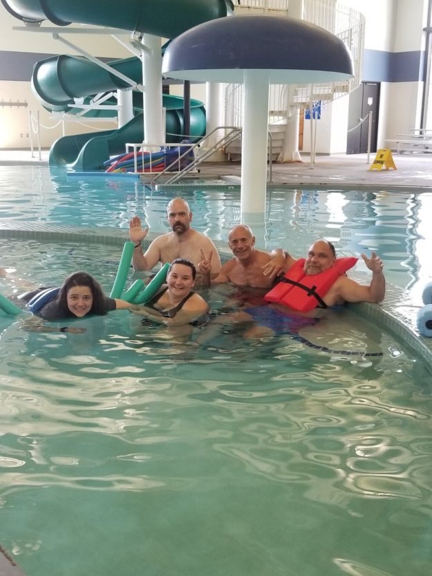 2019swimmingj a group of people at action recovery brain injury services enjoy swimming at the ymca